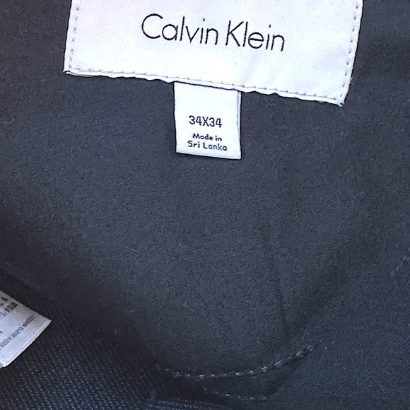 NWOT Calvin Klein pants. Size 34w and 34inseam. Color is blk/gray. - Picture 10 of 12